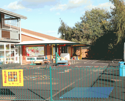 Active-landscapes-playground-equiptment-CS-Plaistow-2-new-fence-with-panels,-new-tarmac-with-graphics-new-large-canopy_small