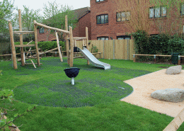 Active landscapes playground equipment General Pic 17 Toddler robinia wood multi unit or climbing frame with spinner bowl on grass mats housing development